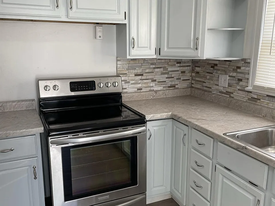 Kitchen with stainless steel stove