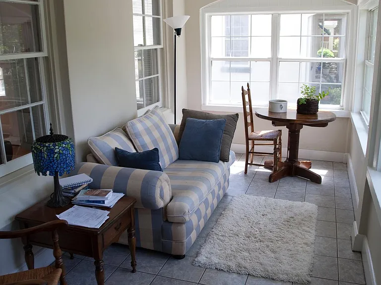 Front porch enclosed and air conditioned looks at 13 acre pa