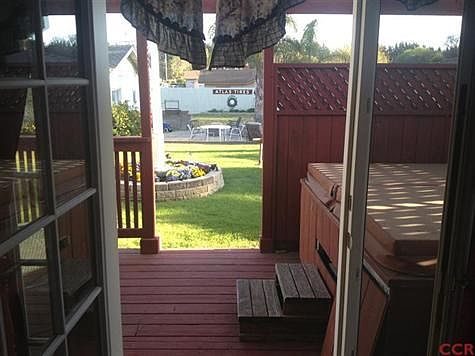 Rear patio deck and spa off of the master bedroom
