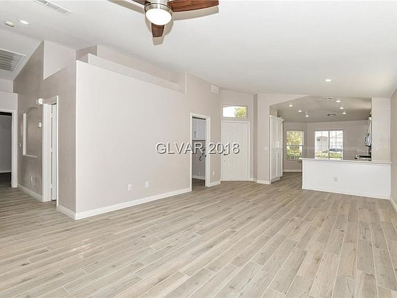 GREAT ROOM TOWARDS ENTRY ,BEAUTIFUL NEW FLOORS