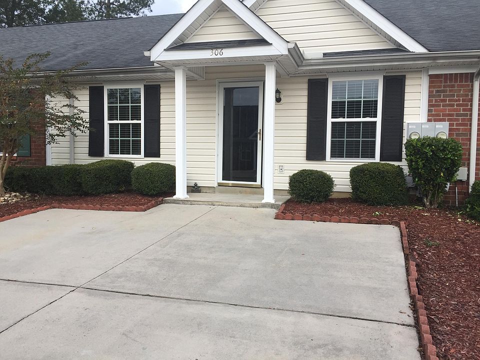 Townhome front with parking for two vehicle