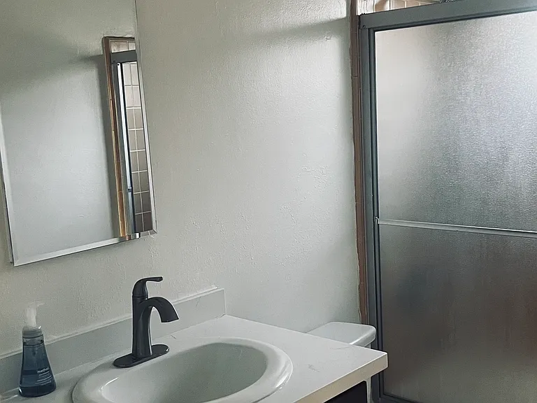 Bathroom with shower and tub