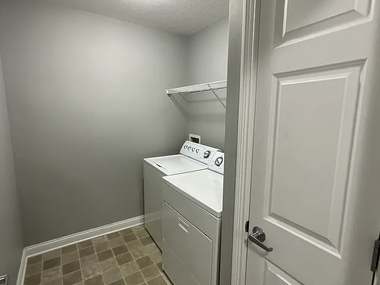 Top floor in unit laundry room