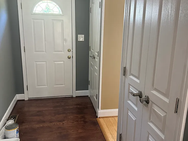 Inside the house facing the front door (foyer.) 1 pantry closet to hold dry goods and 1 coat closet