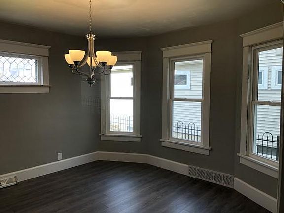 Spacious dining room with large window bay