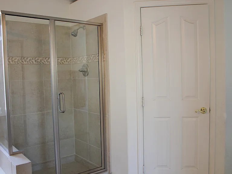 Bedroom #1 - Master suite with walk-in shower and separate door for toilet.