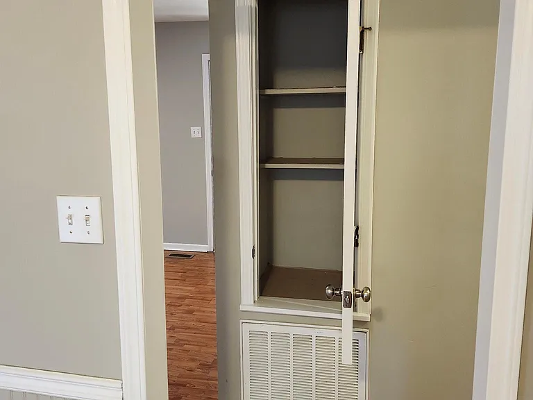 Pantry located directly across from Kitchen