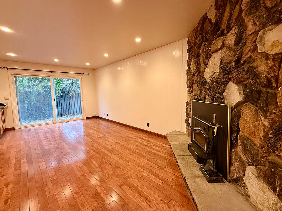 Family Room with Fireplace, Sliding door access to Backyard