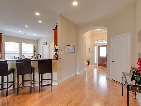 Open floor plan allows interaction between the kitchen and the living areas. Perfect for entertainin
