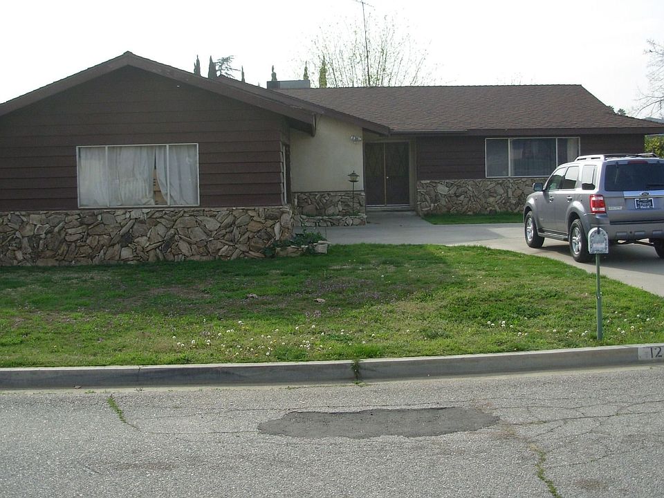 Main view of the front of our house. View is facing west from Euclid Ave.