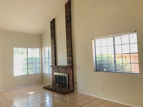 All tiled living room, kitchen & bathrooms