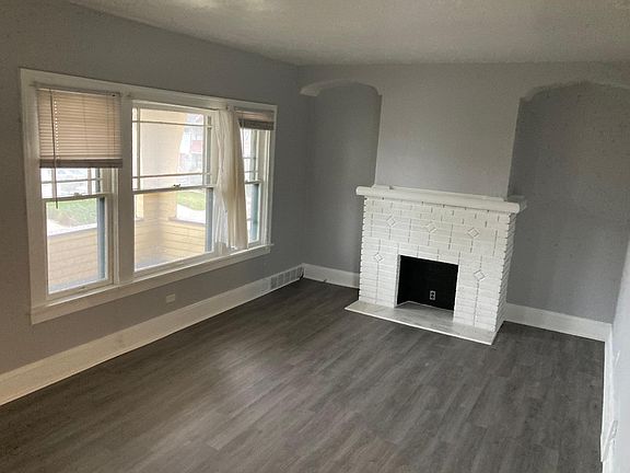 Huge living room with cute fire place