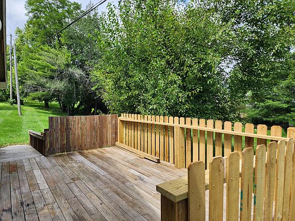 Large back deck with ramp & stairs access