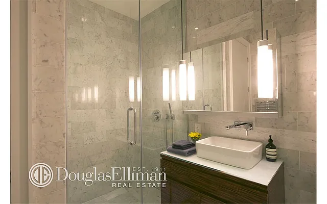 Sold by Douglas Elliman | media 9