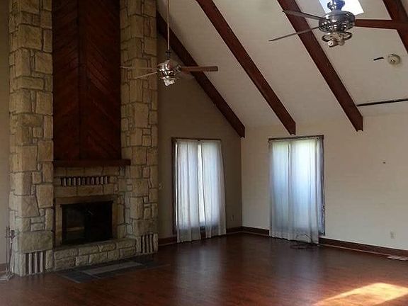 Living room wood burning fireplace