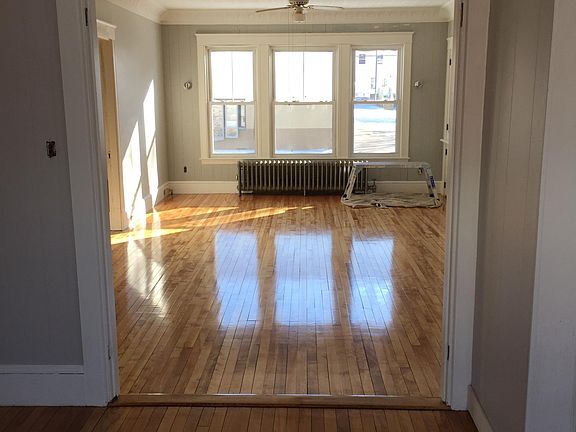 This bedroom with French doors, this is looking into living room.