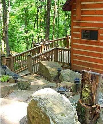 Rock walking path to small cabin.