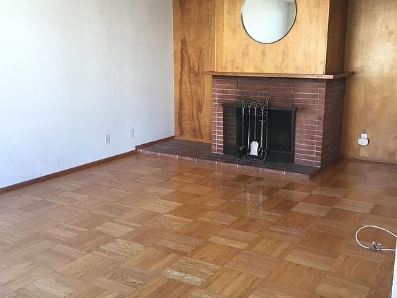 Living room with working fireplace.