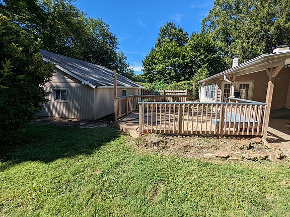 Deck between house and detached 2 car garage
