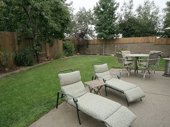 Back yard is a private oasis.