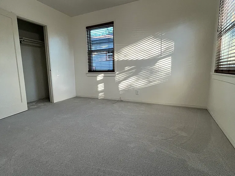 Both the front and back bedrooms are large with full closets.