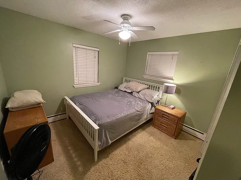 Living Room - Come unfurnished, and has been painted since but wanted to show it with bed/etc in place.
