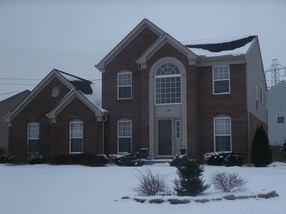 Situated on a corner lot - offers 3 car side entry tandem garage