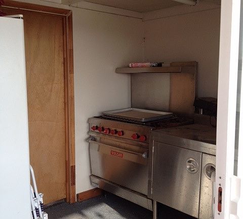 Pool room with stove and Fridg