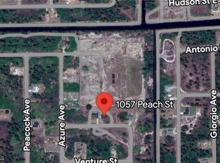 1057 Peach St, Lehigh Acres, FL 33974