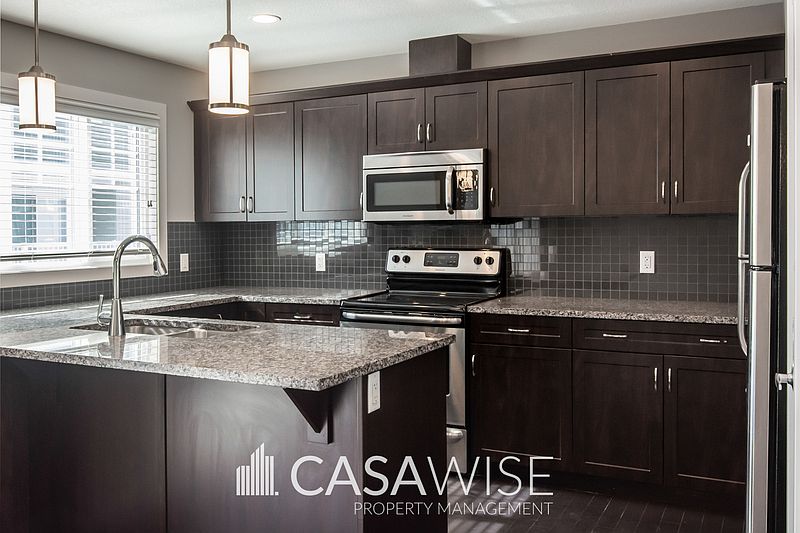 1st image of 140 Youville Dr NW #16