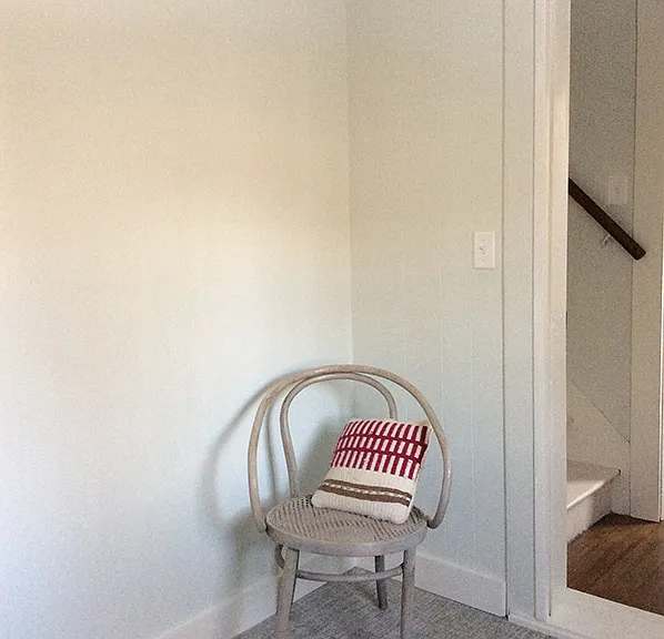Inside the front entrance is a small room that can be used as a mudroom or office.