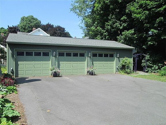 3-car garage and newly paved driveway.