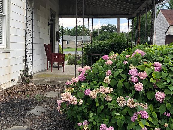 Porch Entrance...add some outdoor blinds or shades to create a private sitting area!