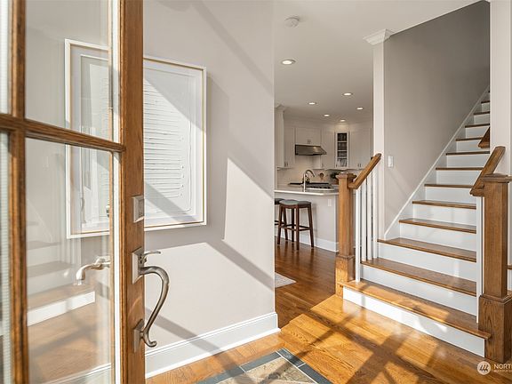 Recently remodeled home with lustrous refinished hardwood floors.>
