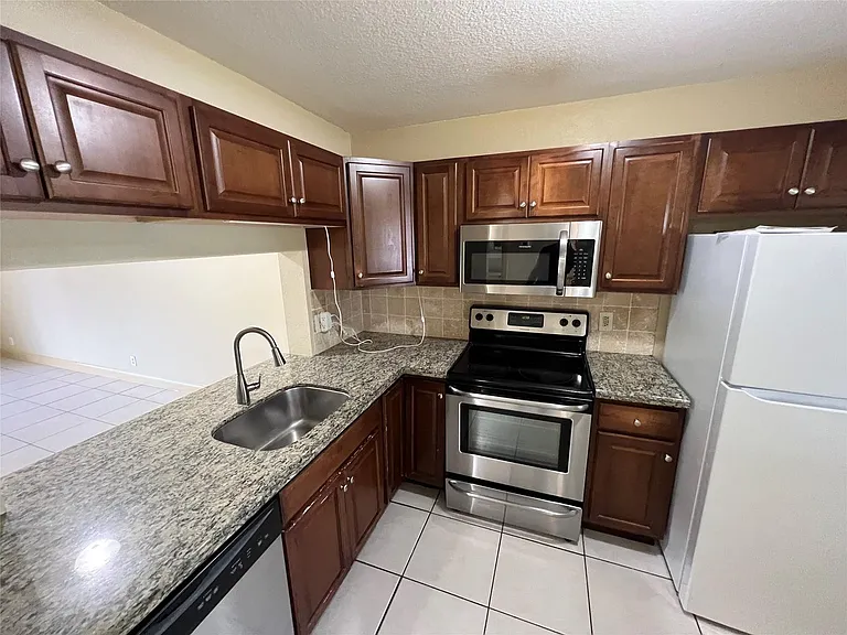 1240 S Military Trl — Photo 14