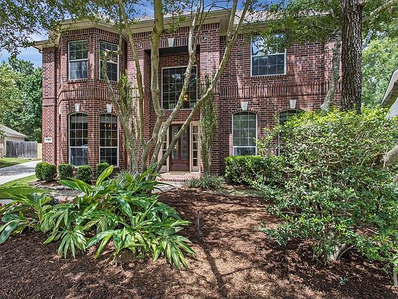 Another view of the home and the lush landscaping.