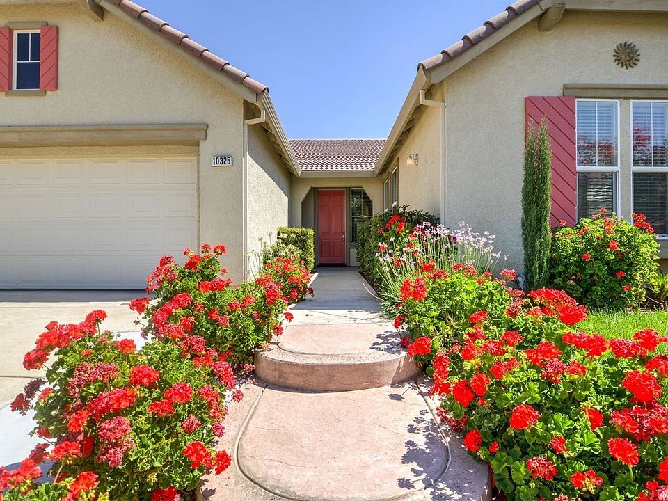 Front of the house with flower