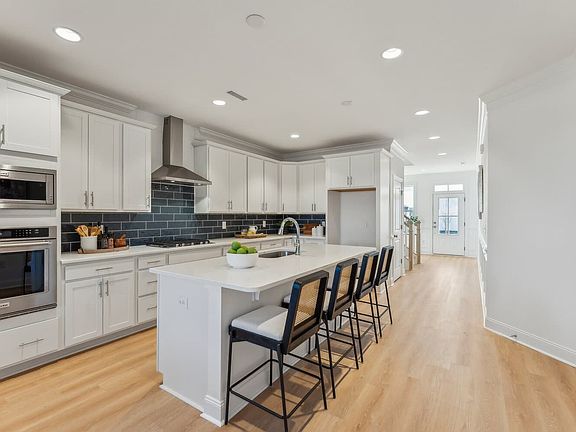 The kitchen of the Declan single family home by Brookfield Residential at Wendell Falls.