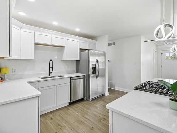 5th image of 1401 W 55th Ave