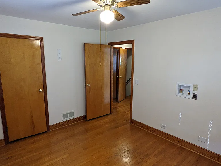 Second bedroom entry view. Located on the main floor. It can also be used as a laundry room.