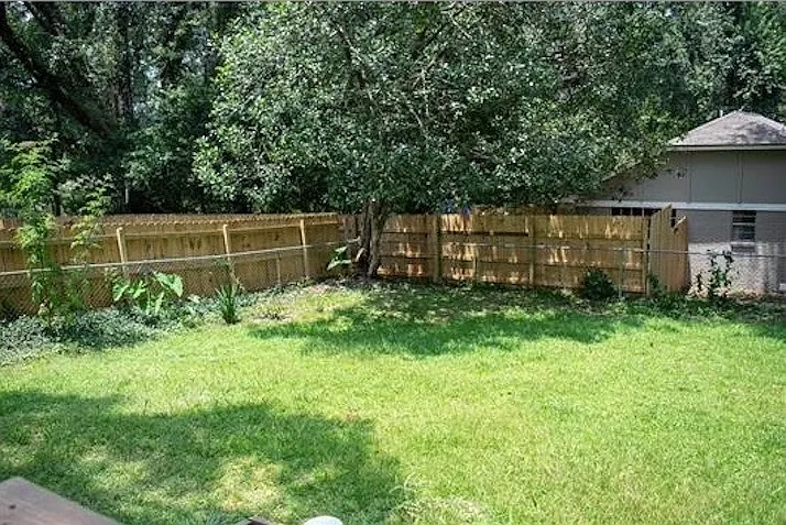 Grassy lawn, not your typical rental.