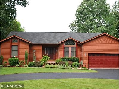Extremely well maintained Cedar sided Rambler!