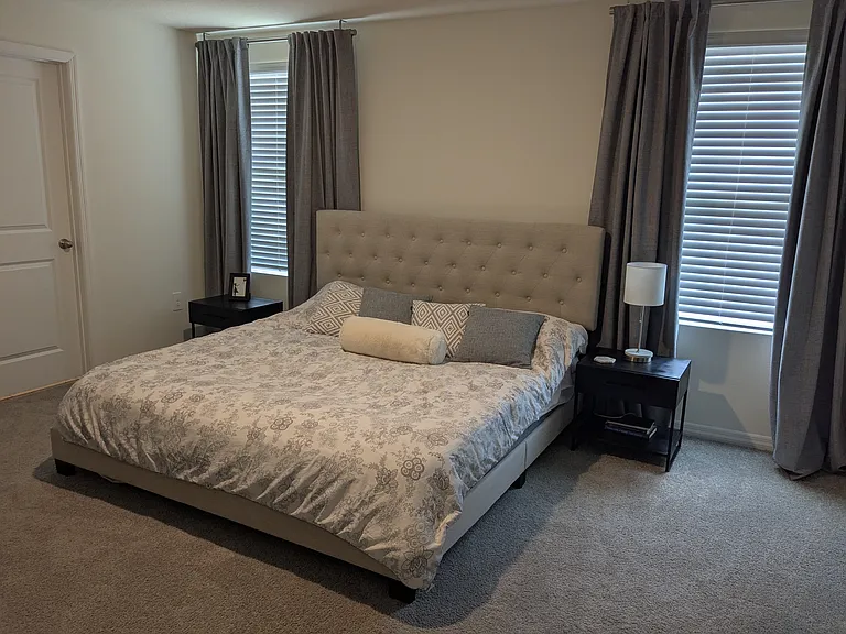 Main bedroom (accommodates king bed easily). On-suite bathroom. Large walk-in closet.