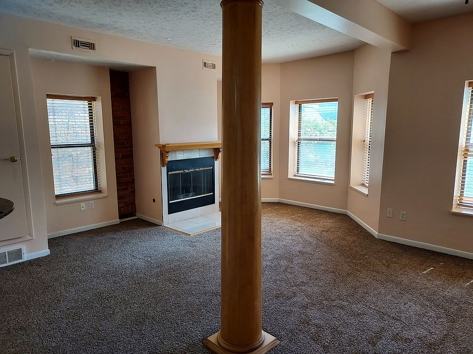 living room/gas fireplace-main entrance view