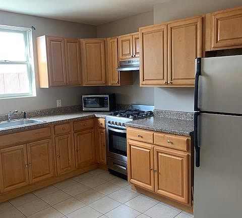 Open kitchen with lots of cabinets