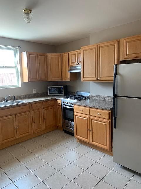 Open kitchen with lots of cabinets