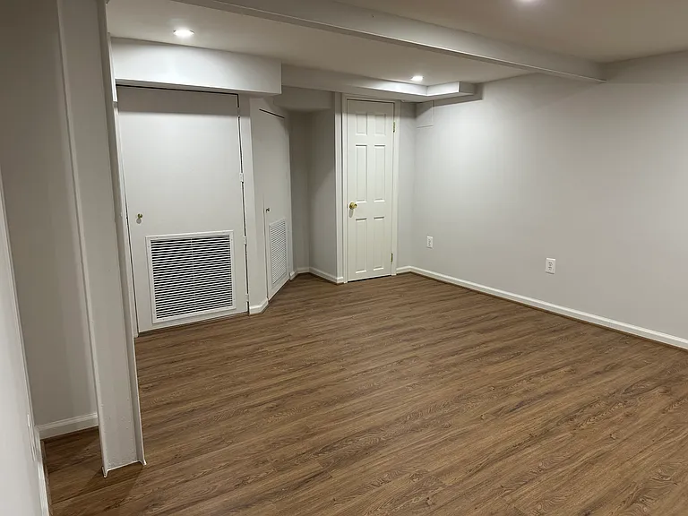 Spacious living room with closet for storage