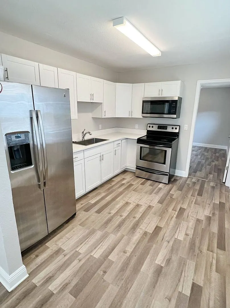 New Remodeled - 3 Bedroom 2 Bath Duplex - 2 Assigned Parking Spaces — Photo 1