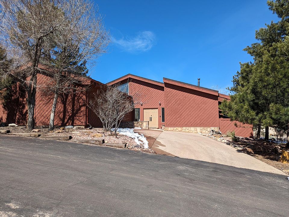 contemporary home tucked in the trees