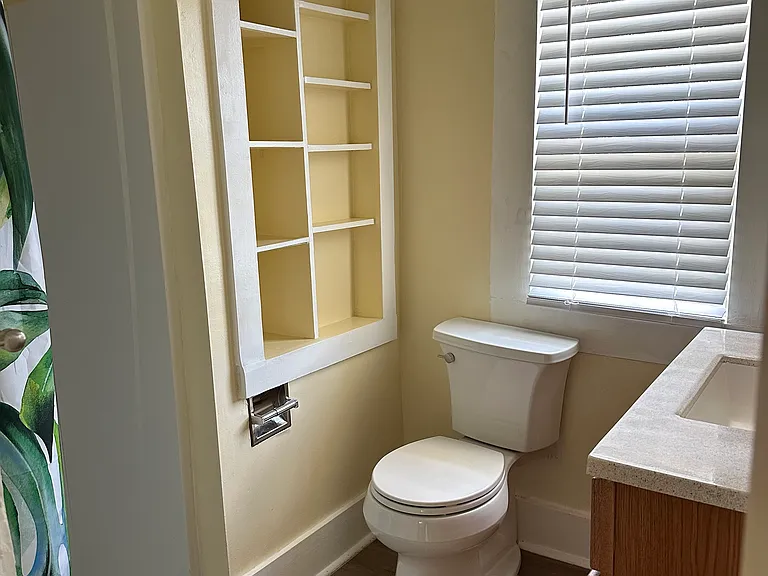 Storage cubbies for towels and toiletries.
